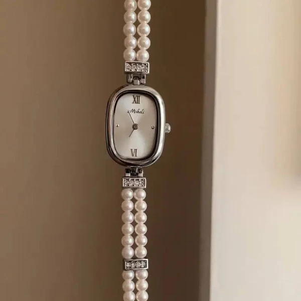 Letni nowy perłowy damski zegarek na łańcuszku