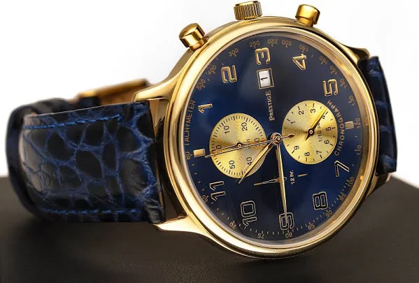 Zegarek złoty z granatowym paskiem